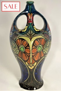 Antique vase with floral decor, Rozenburg. Antieke vaas met bloemdecor, Rozenburg.