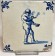 Tile with a pipe smoker, circa 1650. Tegel met een rokende man, circa 1650.-01