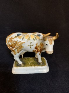 The polychrome figure of a standing cow